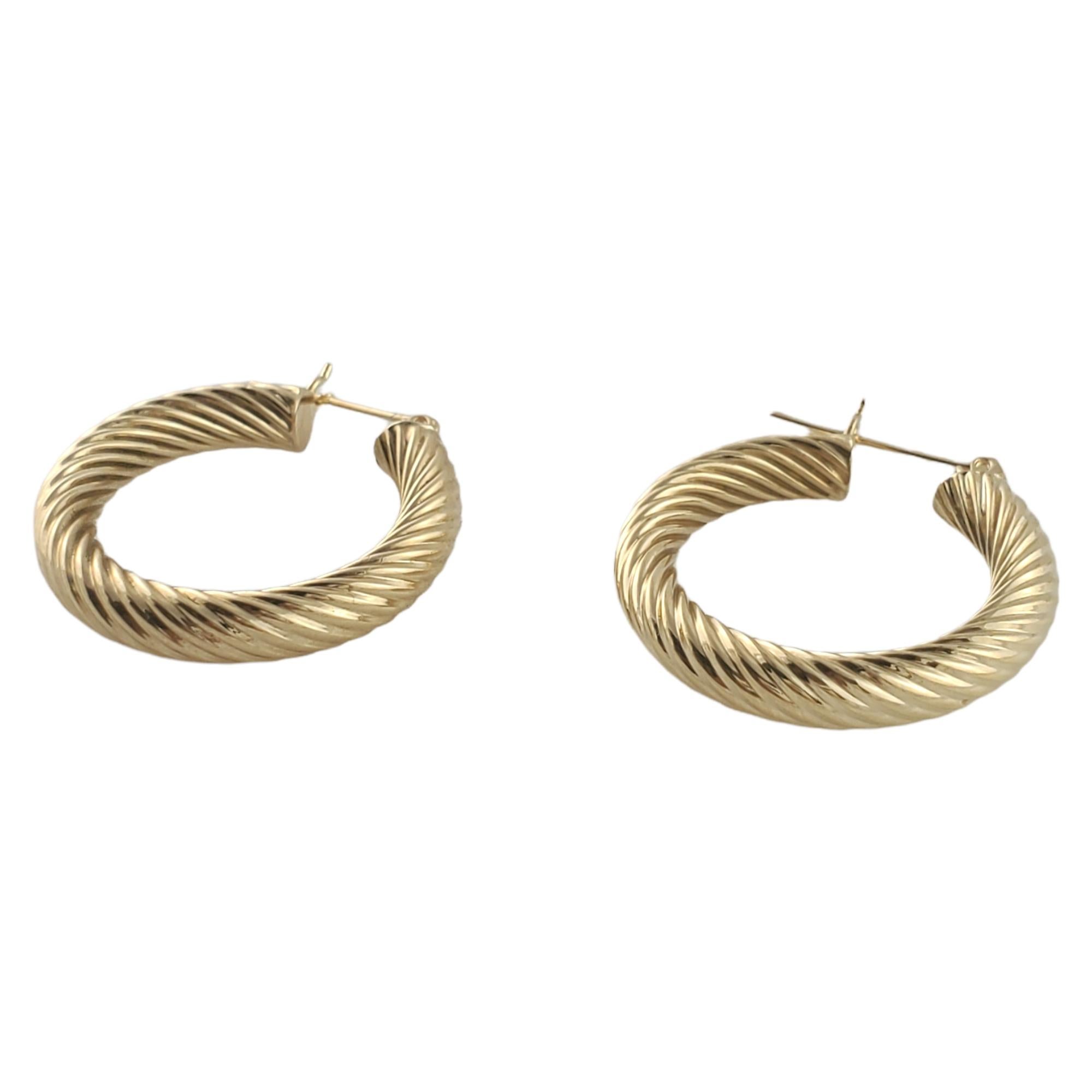 Beautiful pair of 14K gold hoops earrings with a gorgeous twist design!

Size: 23 mm X 23 mm

Weight: 2.8 g/ 1.8 dwt

Hallmark: JCM 14K

Very good condition, professionally polished.

Will come packaged in a gift box and will be shipped U.S.