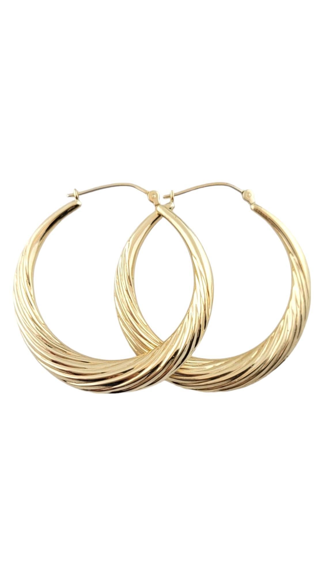 Vintage 14K Yellow Gold Twist Hoop Earrings

This gorgeous set of 14K gold hoops are in a beautiful, twisted pattern that would look amazing on anyone!

Size: 36.3mm X 34.49mm X 4.17mm

Weight: 2.03 dwt/ 3.16 g

Hallmark: 14K MB

Very good