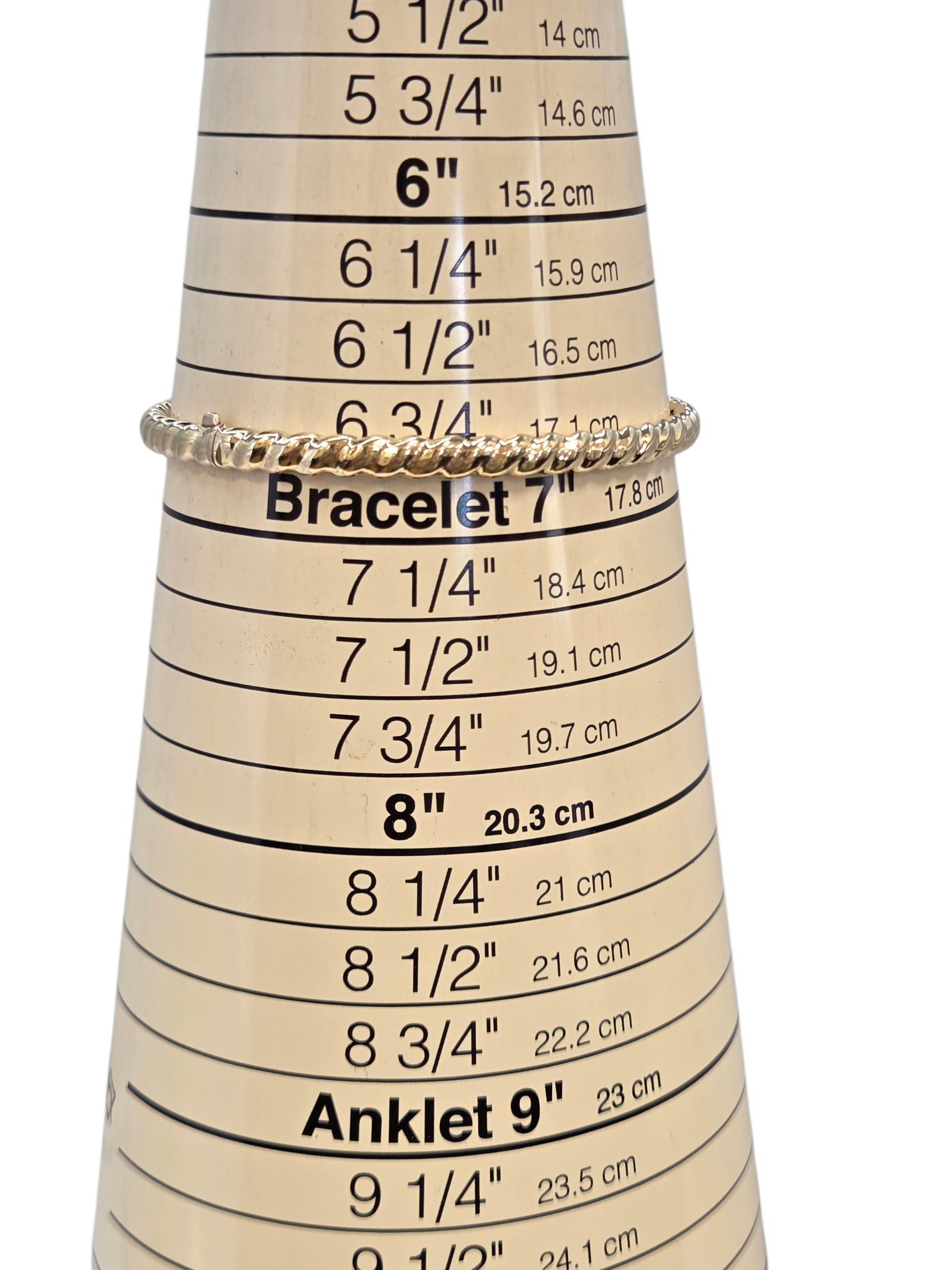 Pulsera brazalete retorcida de oro amarillo de 14 quilates #23886 en venta 1