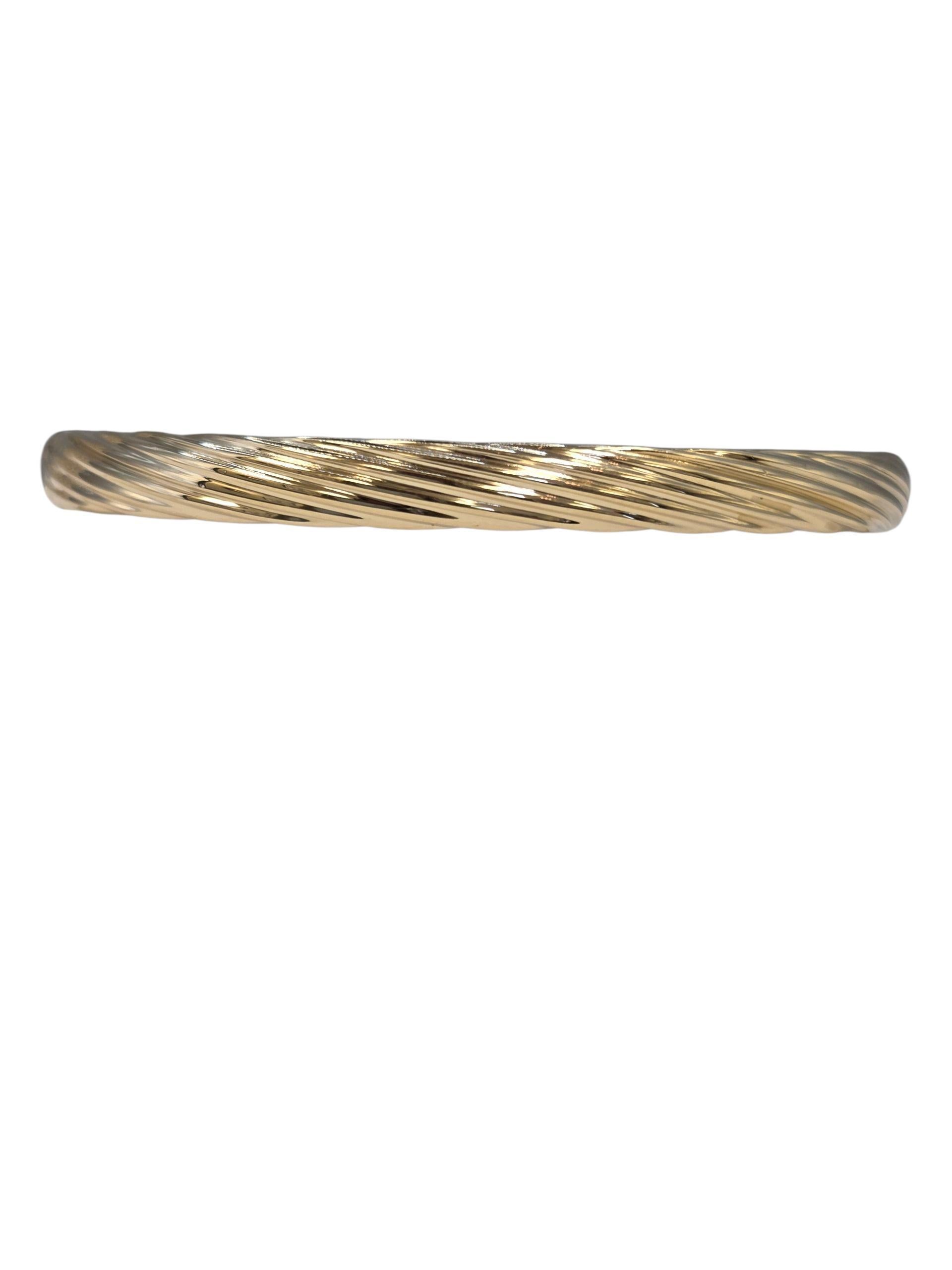 Bracciale Bangle intrecciato in oro giallo 14K

Splendidamente raffinato, questo braccialetto a spirale in oro 14k offre un tocco di grazia e lucentezza senza tempo.

Punzone: 14k ESI

Peso: 7,8 g / 5,0 dwt

Dimensioni: 6,75