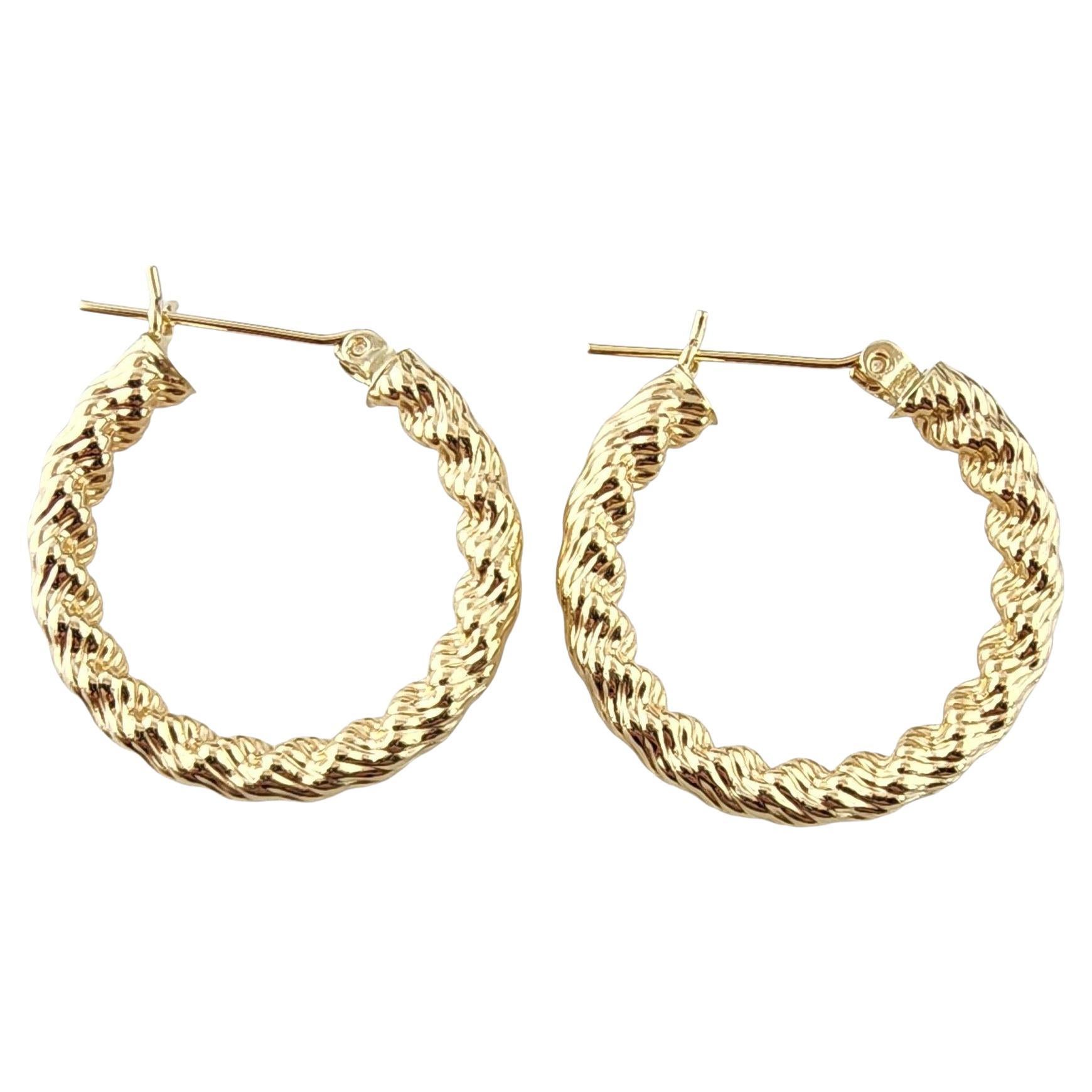 Orecchini a cerchio con cavo ritorto in oro giallo 14k #23064