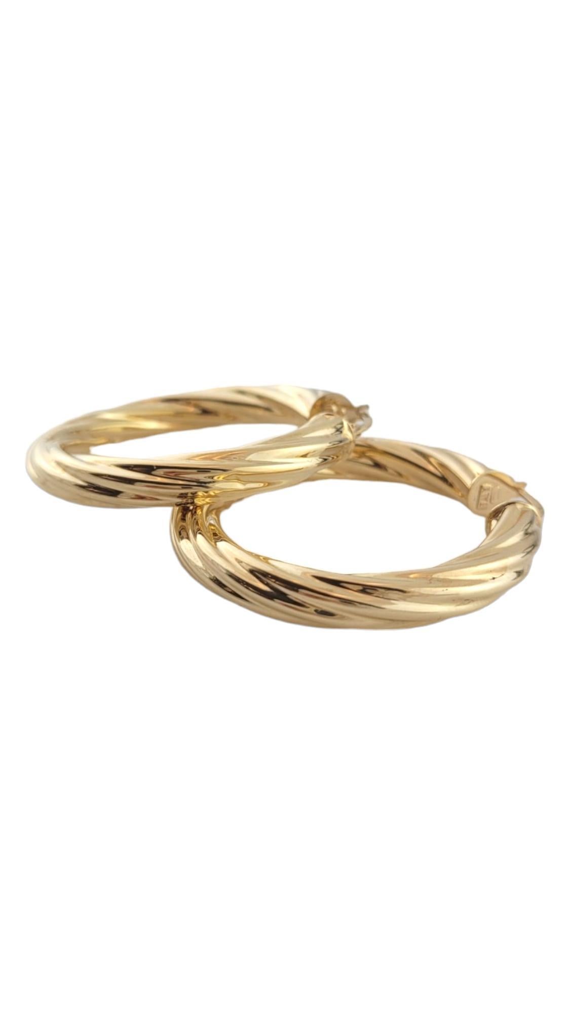 14K Yellow Gold Twisted Circle Hoop Earrings #16197 In Good Condition For Sale In Washington Depot, CT