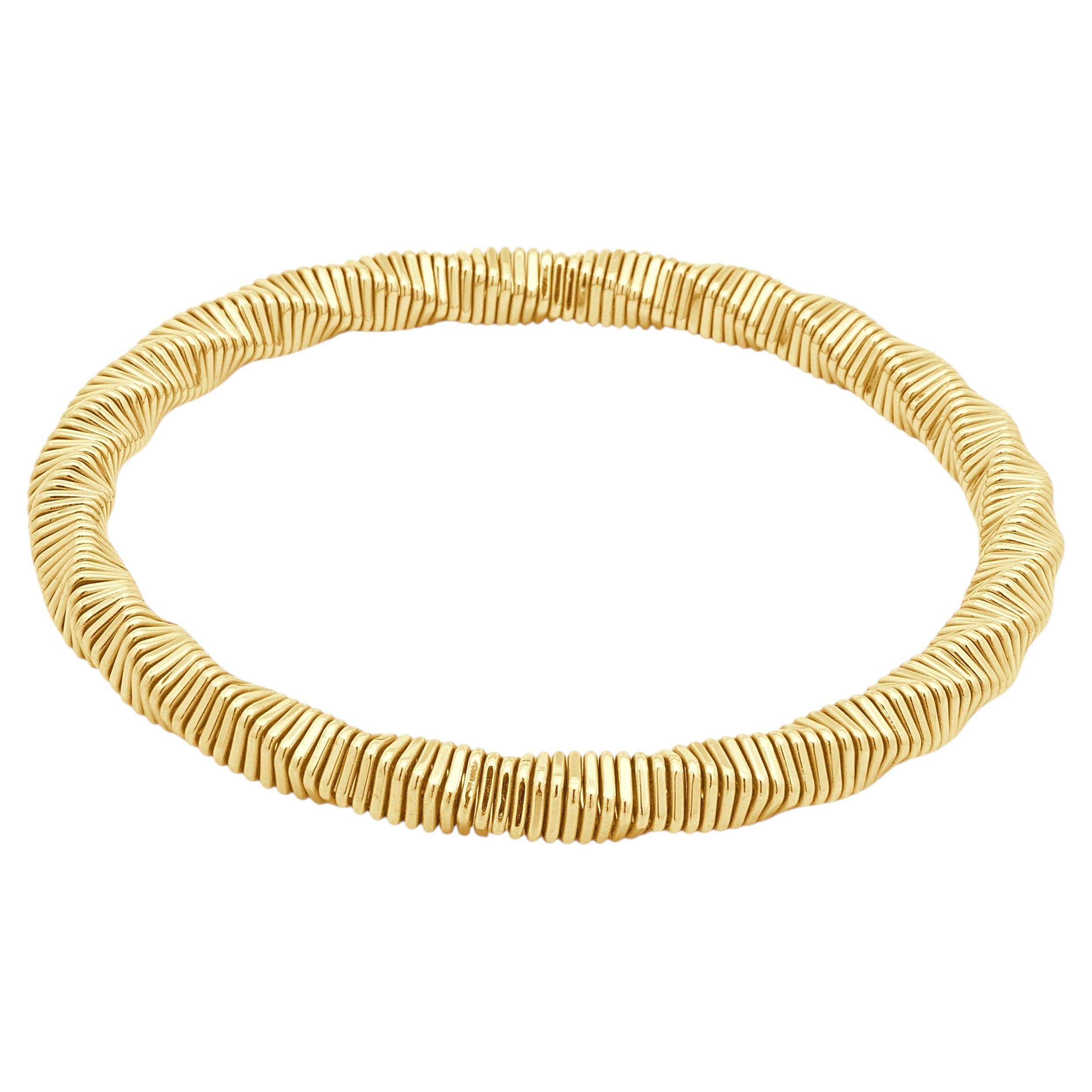 14K Yellow Gold Twisted Flex Bangle Bracelet 7.0"
