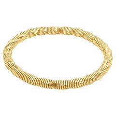 14K Yellow Gold Twisted Flex Bangle Bracelet 7.0"