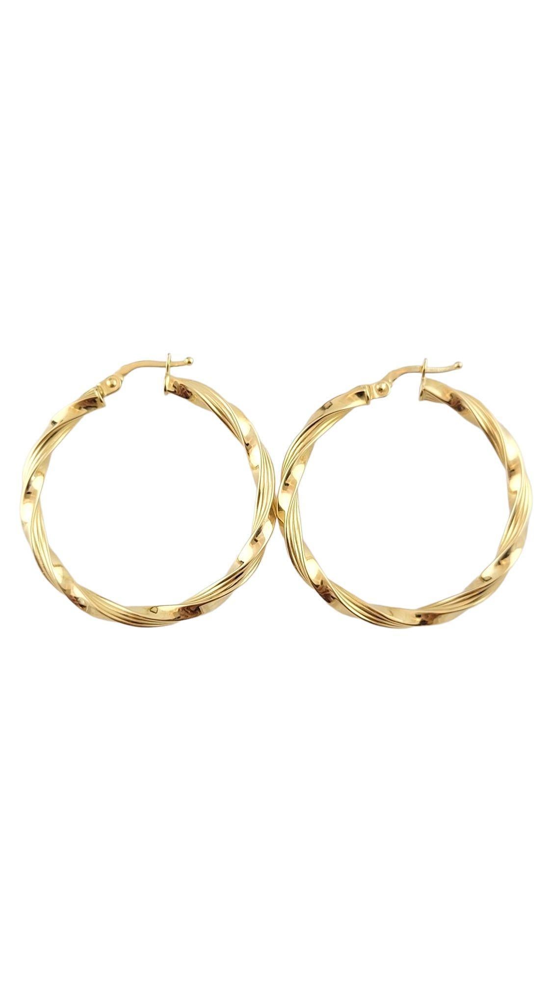 Vintage 14K Yellow Gold Twisted Hoops

Gorgeous set of 14K yellow gold hoops in a twisted design!

Size: 36.4mm X 33.3mm X 13.1mm

Weight: 3.00 g/ 1.9 dwt

Hallmark: 585

Very good condition, professionally polished.

Will come packaged in a gift