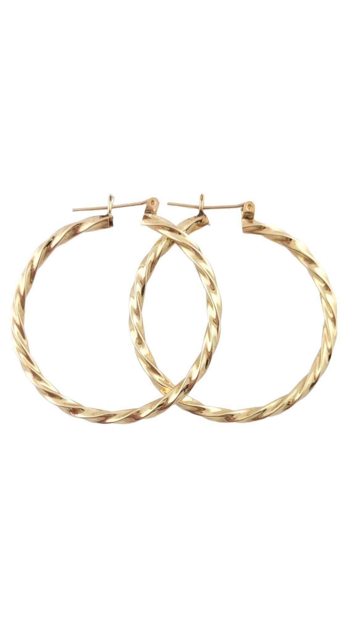 Vintage 14K Yellow Gold Twisted Hoop Earrings

This gorgeous set of twisted hoops are crafted from 14K yellow gold for a beautiful finish!

Diameter 38.25mm
Width: 2.4mm

Weight: 3.0 dwt/ 4.6 g

Hallmark: 14K OJ

Very good condition, professionally