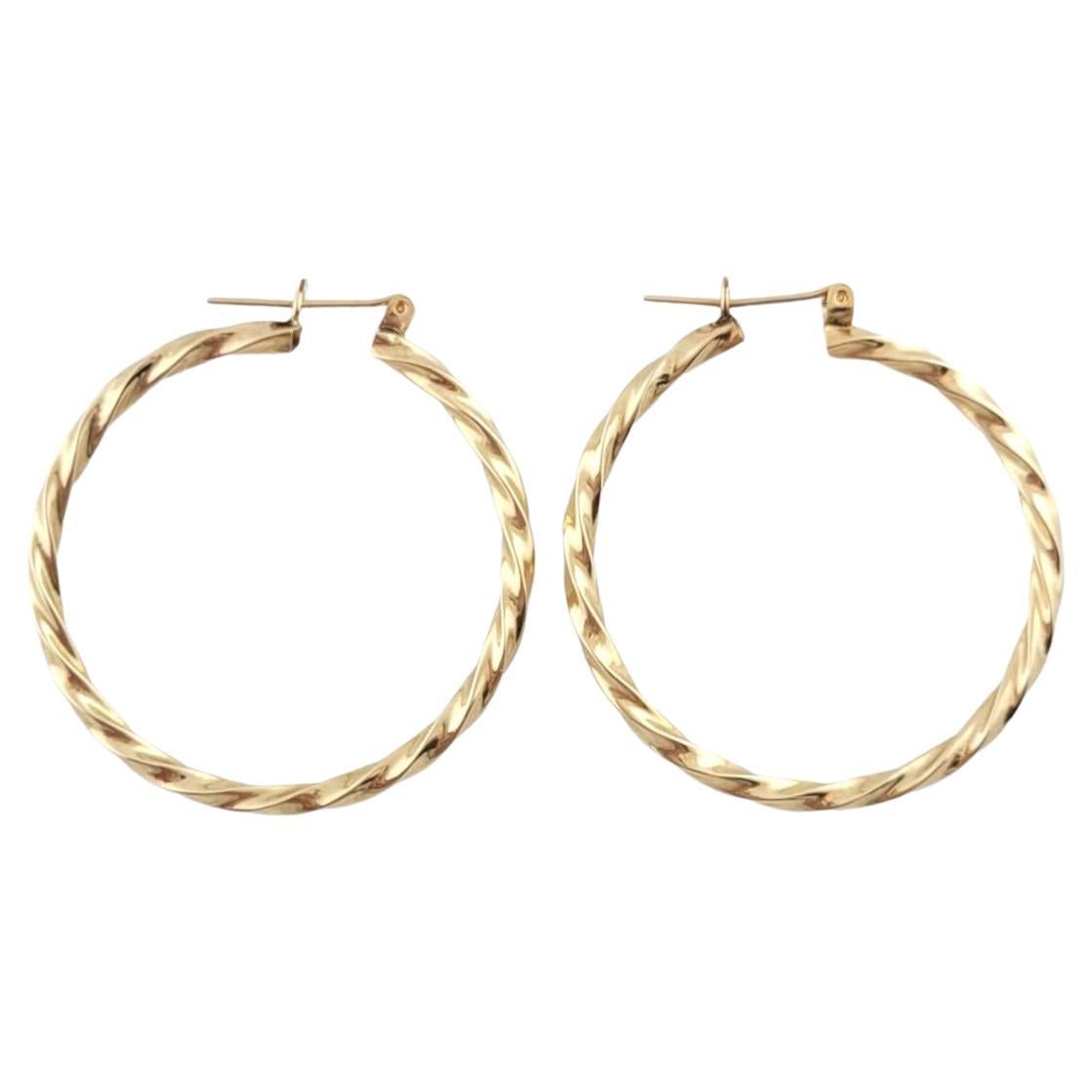 14K Yellow Gold Twisted Hoop Earrings #16191