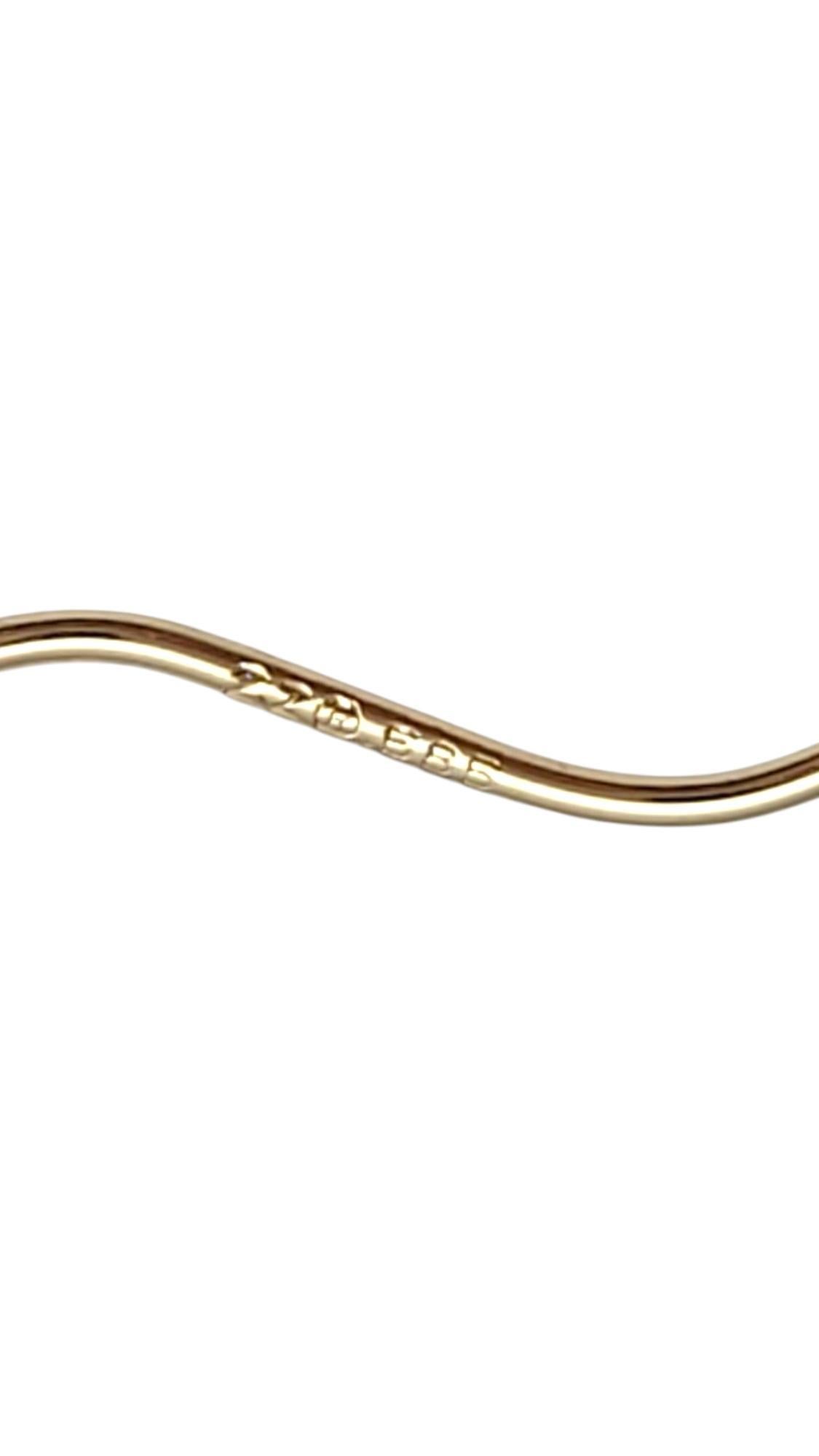 Women's 14K Yellow Gold Twisted Hoop Earrings #21111 For Sale
