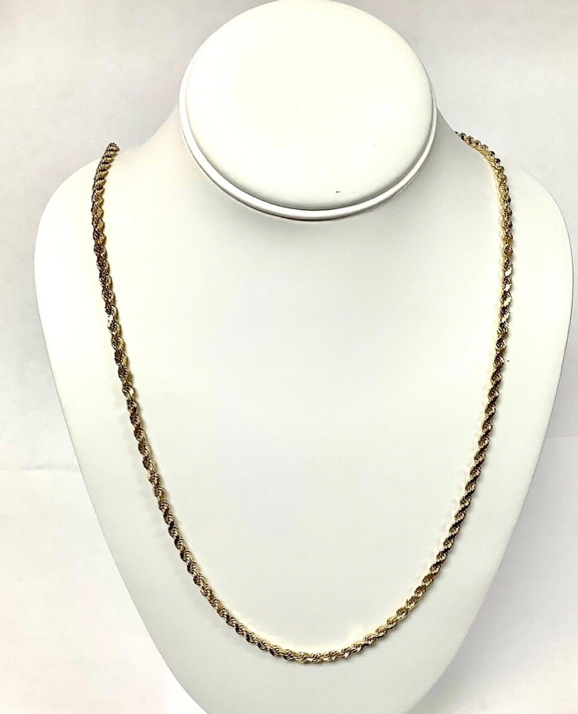 14k gold rope chain necklace. The necklace measures 30 inches. Secure barrel clasp. It is marked 14k and it weighs 39.04 Grams. 