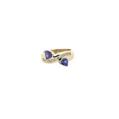 14k Yellow Gold Two-Stone Tanzanite and 0.25ctw Diamond Ring