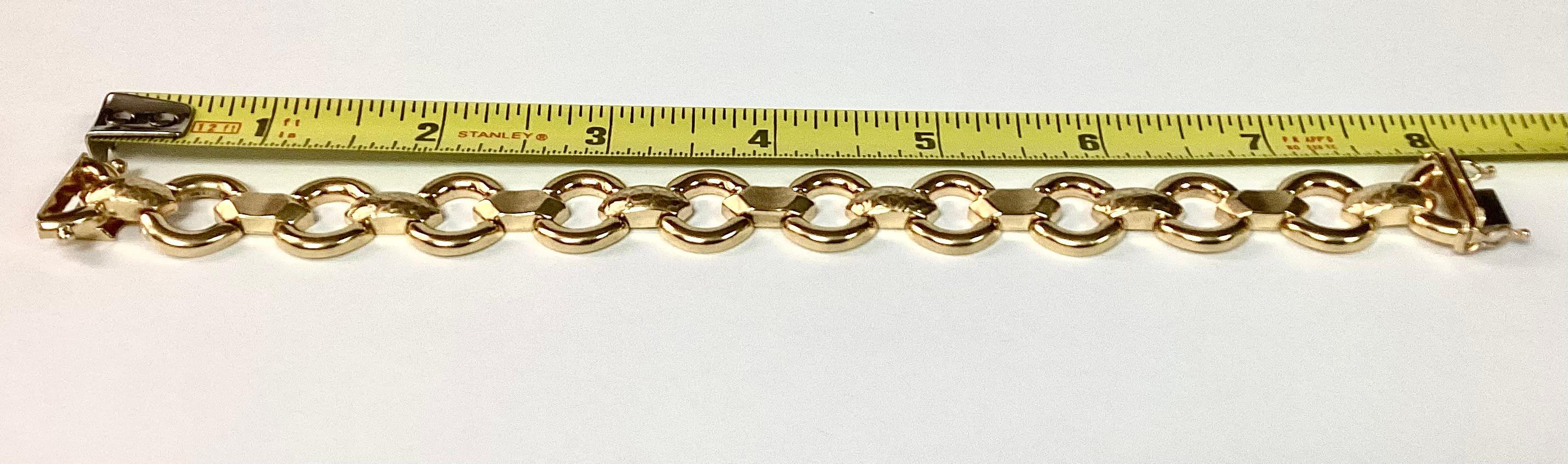 14k yellow gold link bracelet. Open box secure clasp with double safety latch.