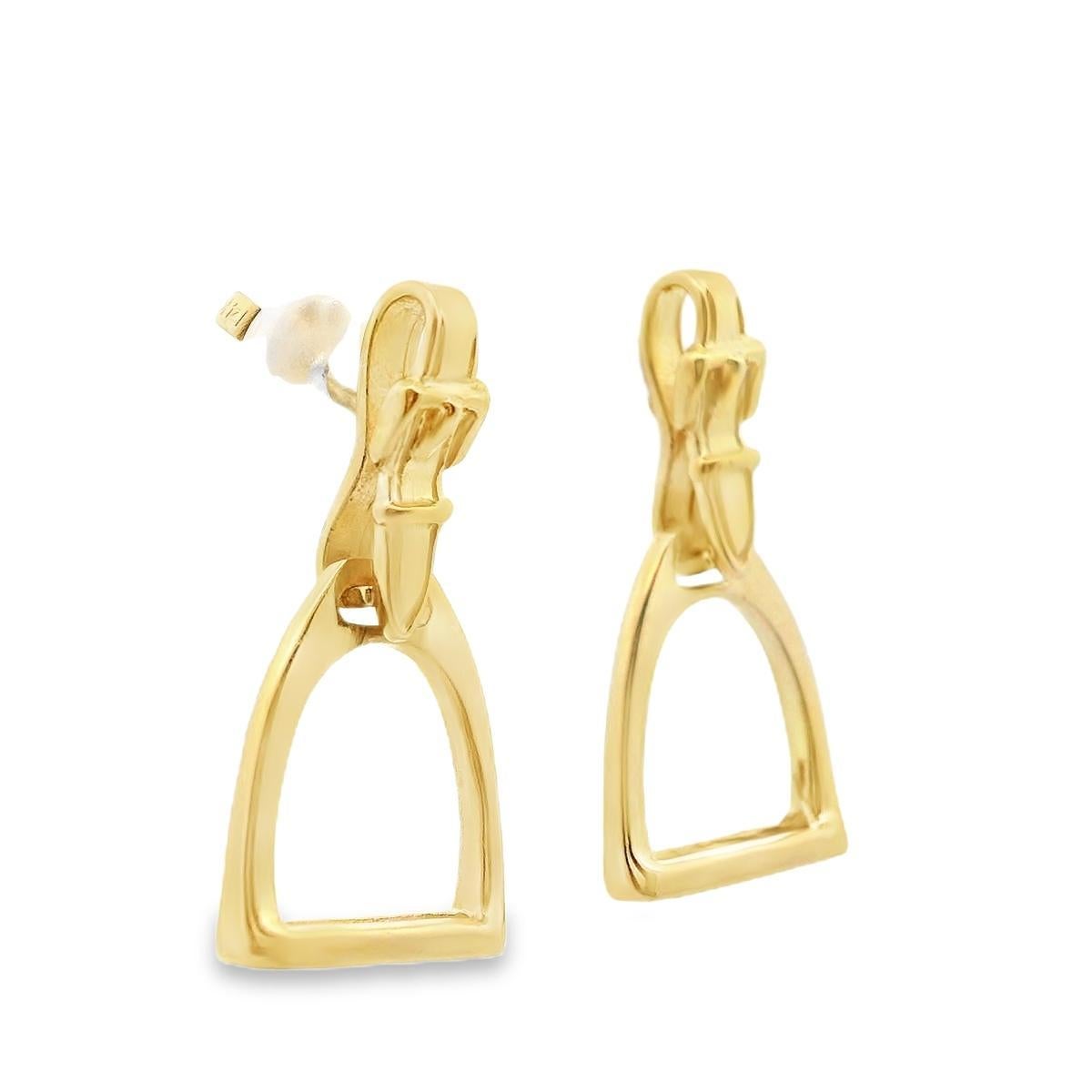 These gorgeous horse stirrup earrings are made by the beloved Van Dell in 14k yellow gold. These detailed earrings are super fun and perfect for anyone who loves horses or, or is part of the equestrian/racing community. The leather strap of the