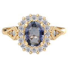 Verlobungsring, 14 Karat Gelbgold Wiener Diamant Sternblauer Saphir Halo