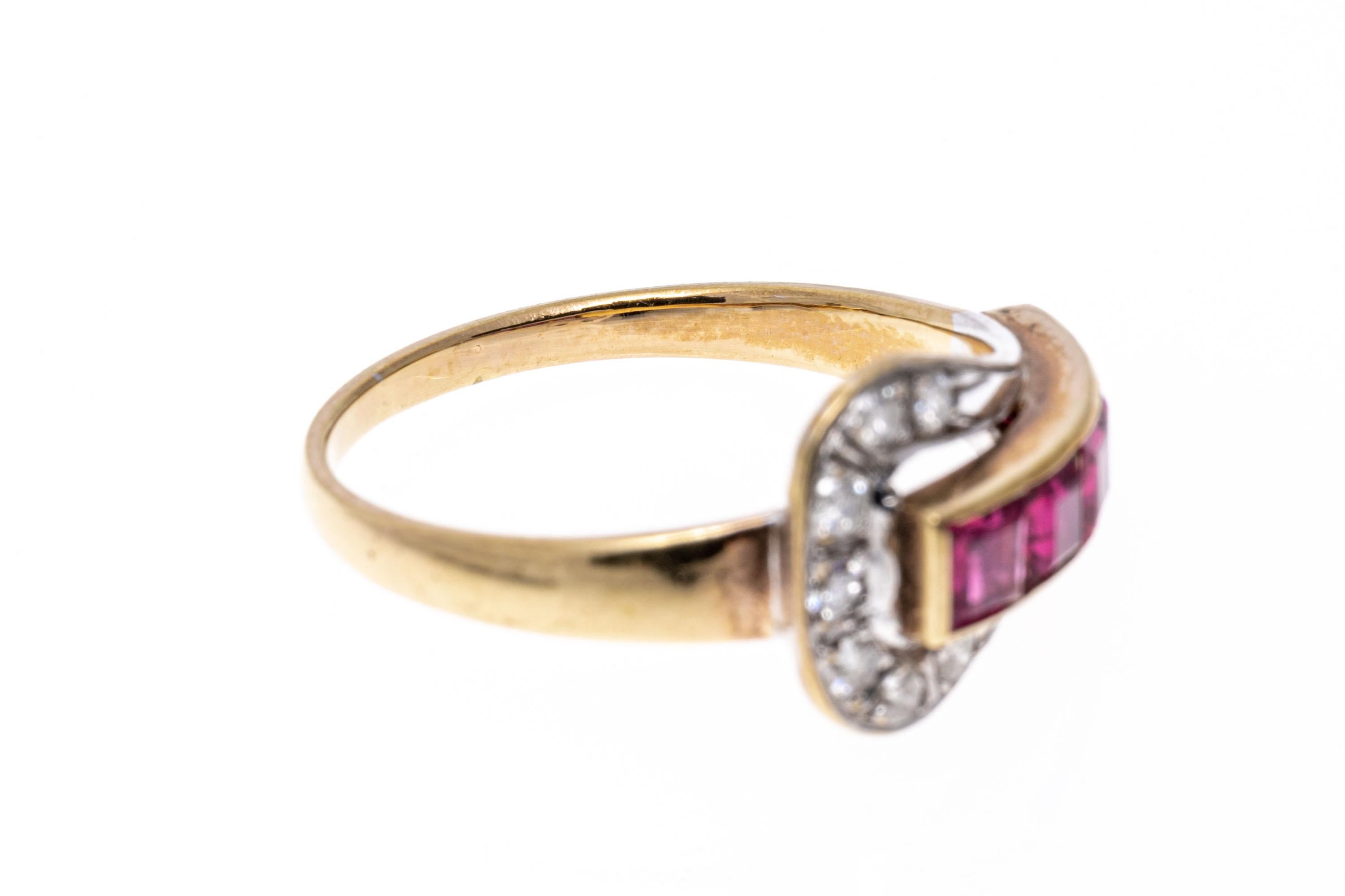 14k yellow gold ring. This yellow gold vintage ring is a retro buckle style, set with a row of square faceted, reddish pink rubies, approximately 1.25 TCW, channel set, and adorned with a yellow gold buckle set with round faceted diamonds,