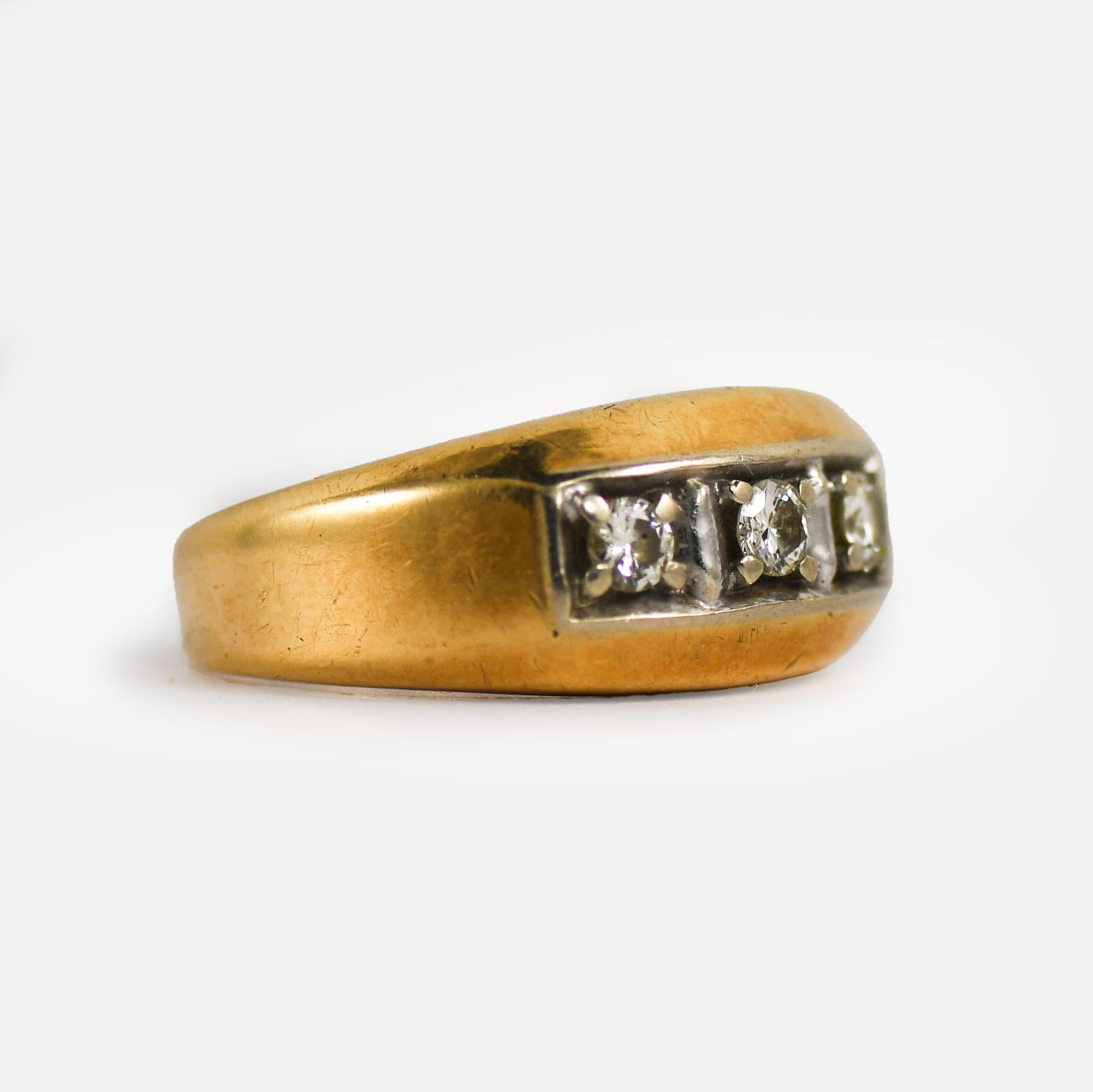 14k yellow gold Diamond ring. 
There is .30tdw, SI-VS Clarity, J-K-L Color.
Stamped 14k, weighs 8.5gr
Size 9 1/2.
Can be sized up or down one size for an additional fee. 