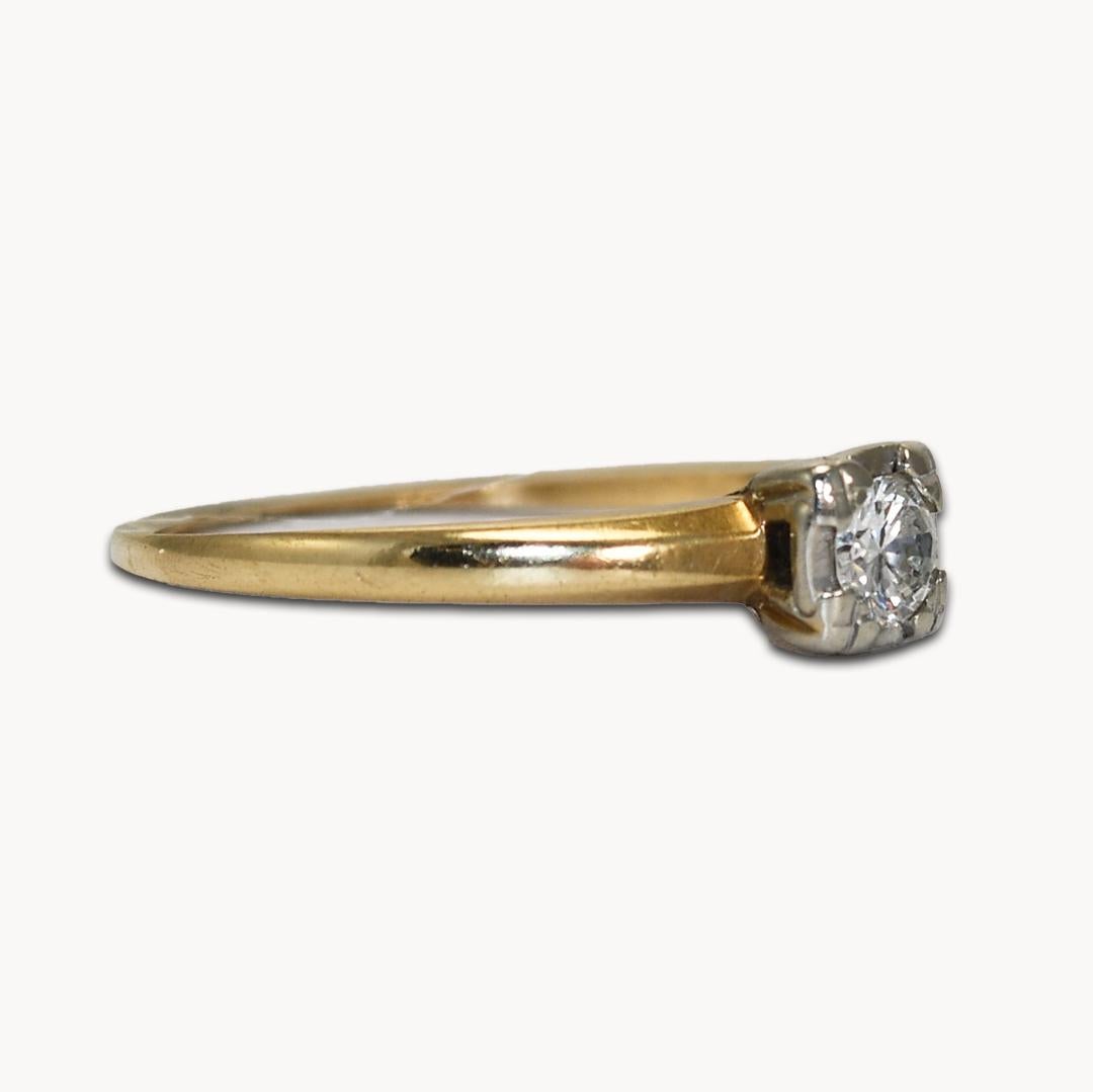 Vintage 14k Yellow Gold Estate Diamond Ring.
1.8 grams total weight.
3.7mm diameter diamond which is about a .20ct.
Size 5.75.
STAMPED 14k.