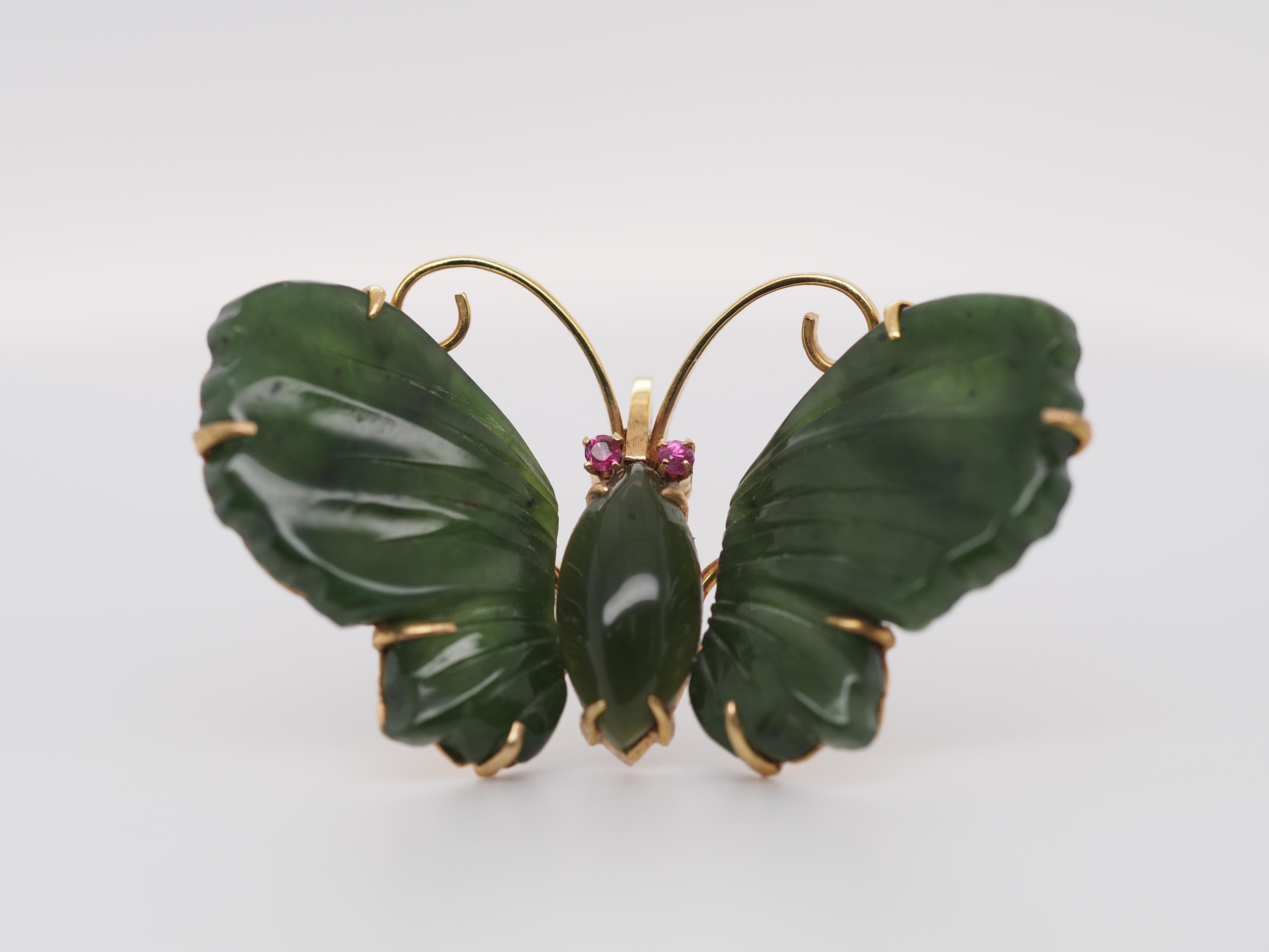 Item Details:
Metal Type: 14K Yellow Gold [Hallmarked, and Tested]
Weight: 10.0 grams
Stone Details:
Cut: Butterfly Wings (2) and Marquise Shape (1)
Color: Green (Dark/Forest)
Ruby Details:
Weight: .08ct, total weight
Cut: Round Transitional