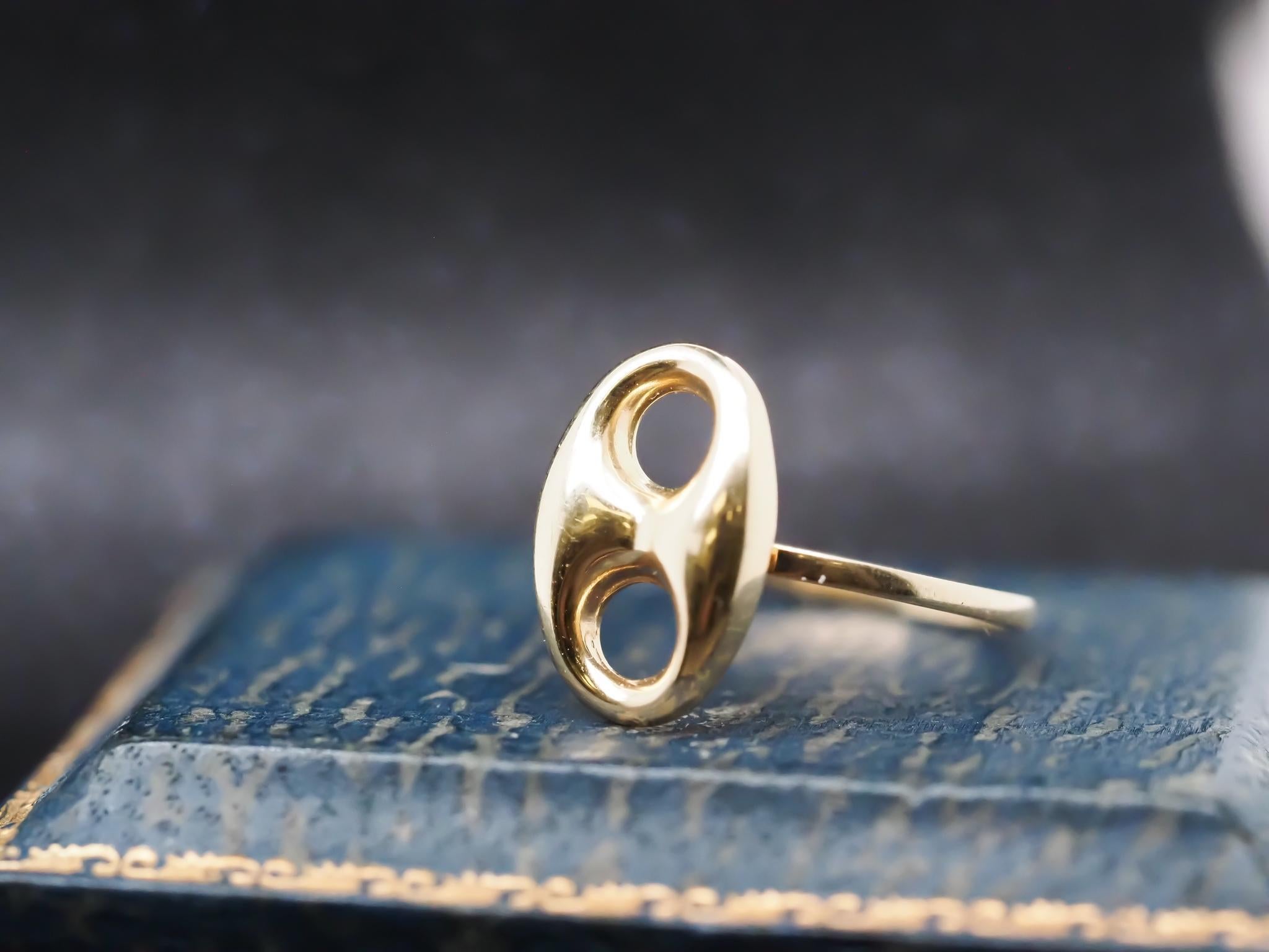 Year: 1990s
Item Details:
Ring Size: 7.25 (Sizable)
Metal Type: 14k Yellow Gold [Hallmarked, and Tested]
Weight: 1.3 grams
Head of ring measures 14m north to south
Band Width: 1.2mm
Condition: Excellent