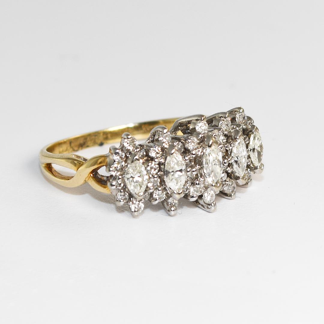 Vintage Marquise und runder Diamant-Cocktailring aus 14k Gelbgold. 
Gestempelt 14k und wiegt 4,4 Gramm.
Fünf marquiseförmige Diamanten sind von runden Diamanten im Brillantschliff umgeben.
Es gibt insgesamt 1,00 Karat Diamanten, Farbe H bis I,