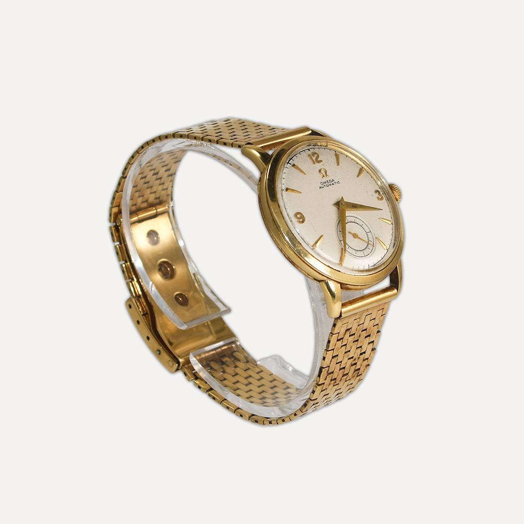 Men's 14k yellow gold vintage Omega Constellation automatic wristwatch.
Weighs 61.7 grams gross weight.
32mm case size.
17 jewel automatic movement.
Time tested for 8 hours and kept time. 
Circa 1950.
The back of the case is engraved as an award to