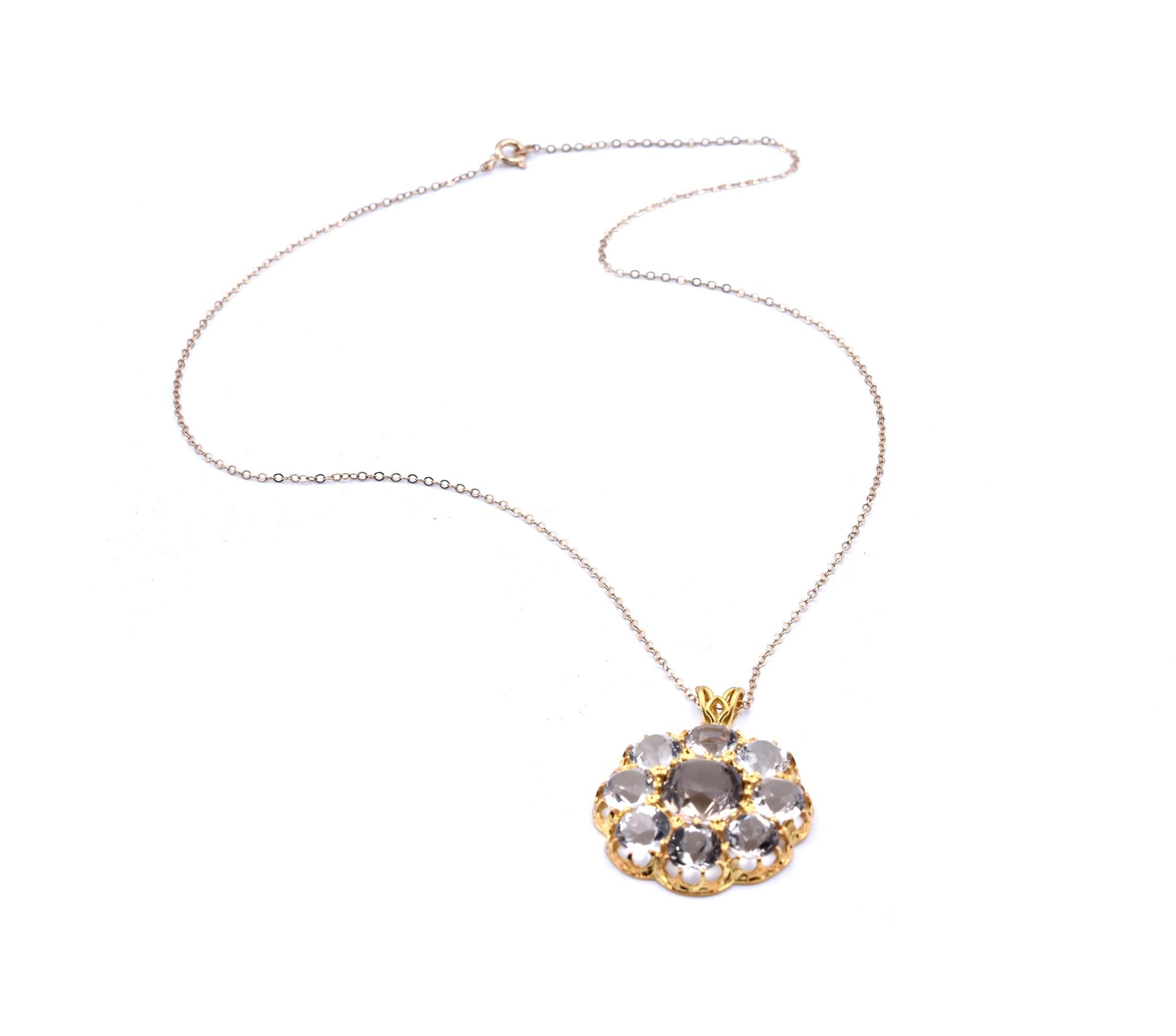 Designer: custom design
Material: 14k yellow gold
Dimensions: necklace is 18” in length, quartz pendant is 1 ¼-inches long with bail and has a diameter of 53mm
Weight: 7.11 grams
