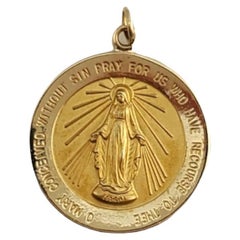 Pendentif Vierge Marie en or jaune 14 carats