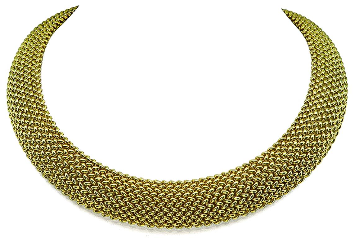 This elegant 14k yellow gold necklace features an impressive weave motif. The necklace measures 20mm in width and 17 1/2 inches in length.
It is stamped 585 and weighs 102.6 grams.
Item #41171AESS