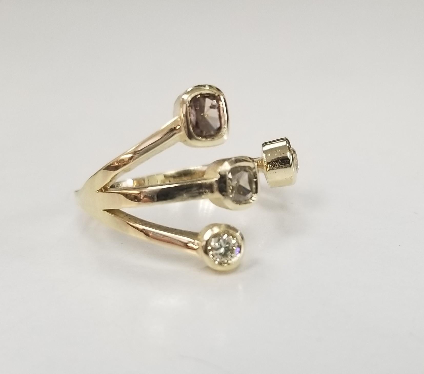 14K yellow gold White and Brown Diamonds split ring
Specifications:
    MAIN stone:   4 White and Brown Diamonds .59pts,    
    metal: 14K YELLOW GOLD
    type: RING
    weight: 4 GRS 
    size: 6.75 US
*Pick your stones and shape*