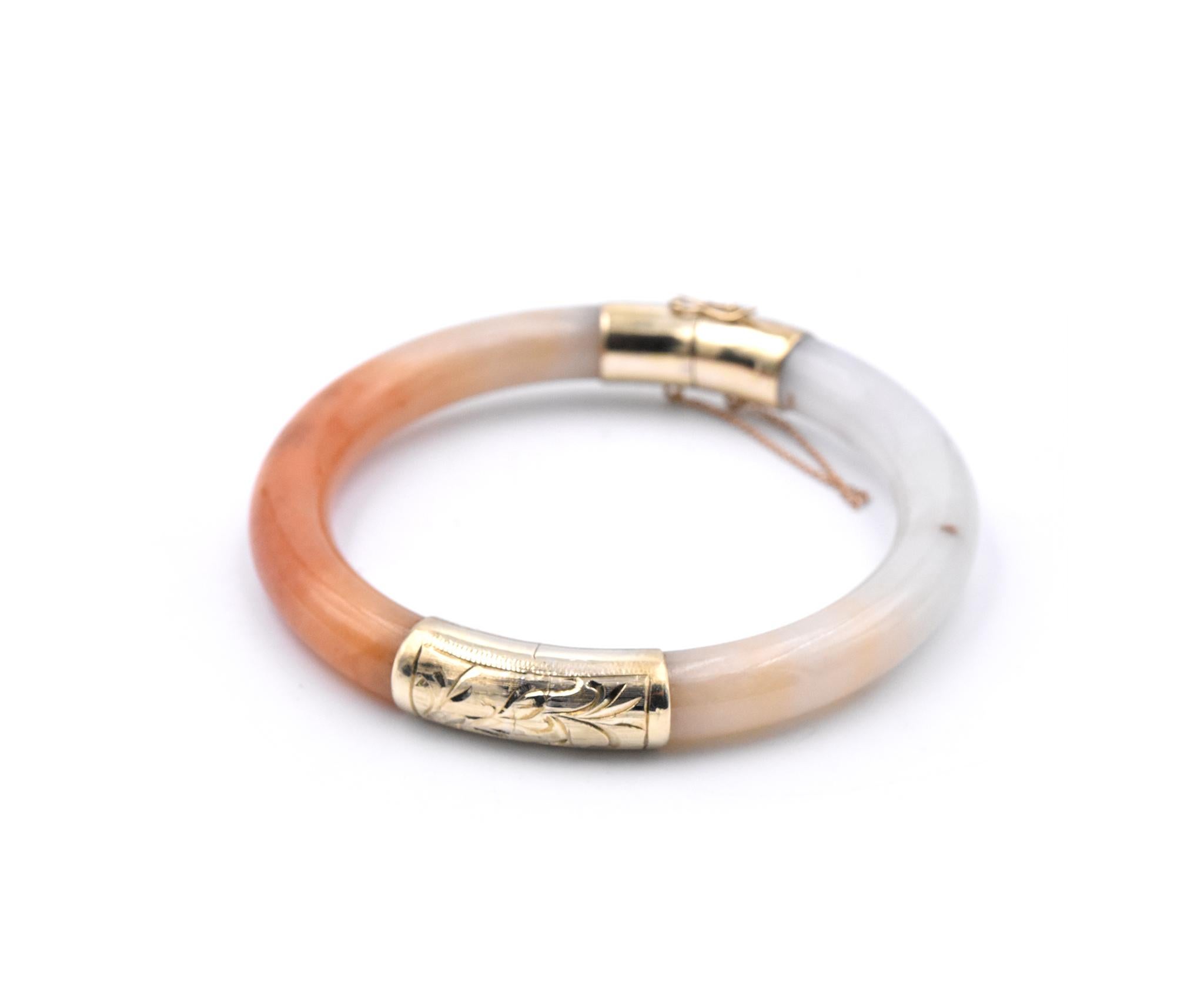 Designer: custom
Material: 14k yellow gold
Gemstone: Jade
Dimensions: bracelet will fit a 6.5-inch wrist 
Weight: 40.9 grams
