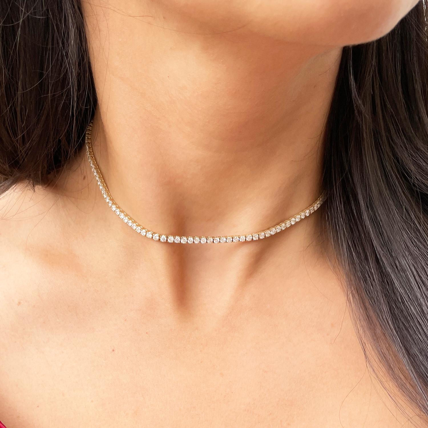 Introducing a contemporary twist to the classic diamond tennis necklace: the ultimate addition to your layered ensemble. Our modern version of the timeless accessory is guaranteed to elevate any outfit and add a touch of glamour to your everyday