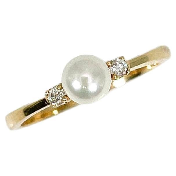 Ring aus 14 Karat Gelbgold mit weißer Perle und Diamant  im Angebot