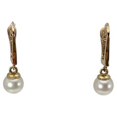 Boucles d'oreilles pendantes en or jaune 14K et perles blanches