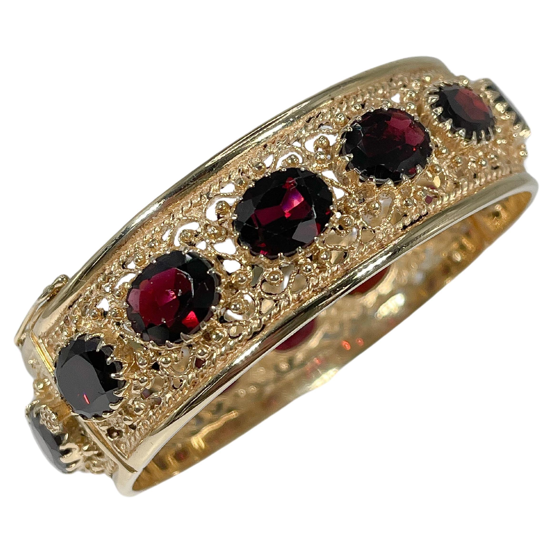 14K Yellow Gold Wide Fancy Oval Garnet Bangle  For Sale