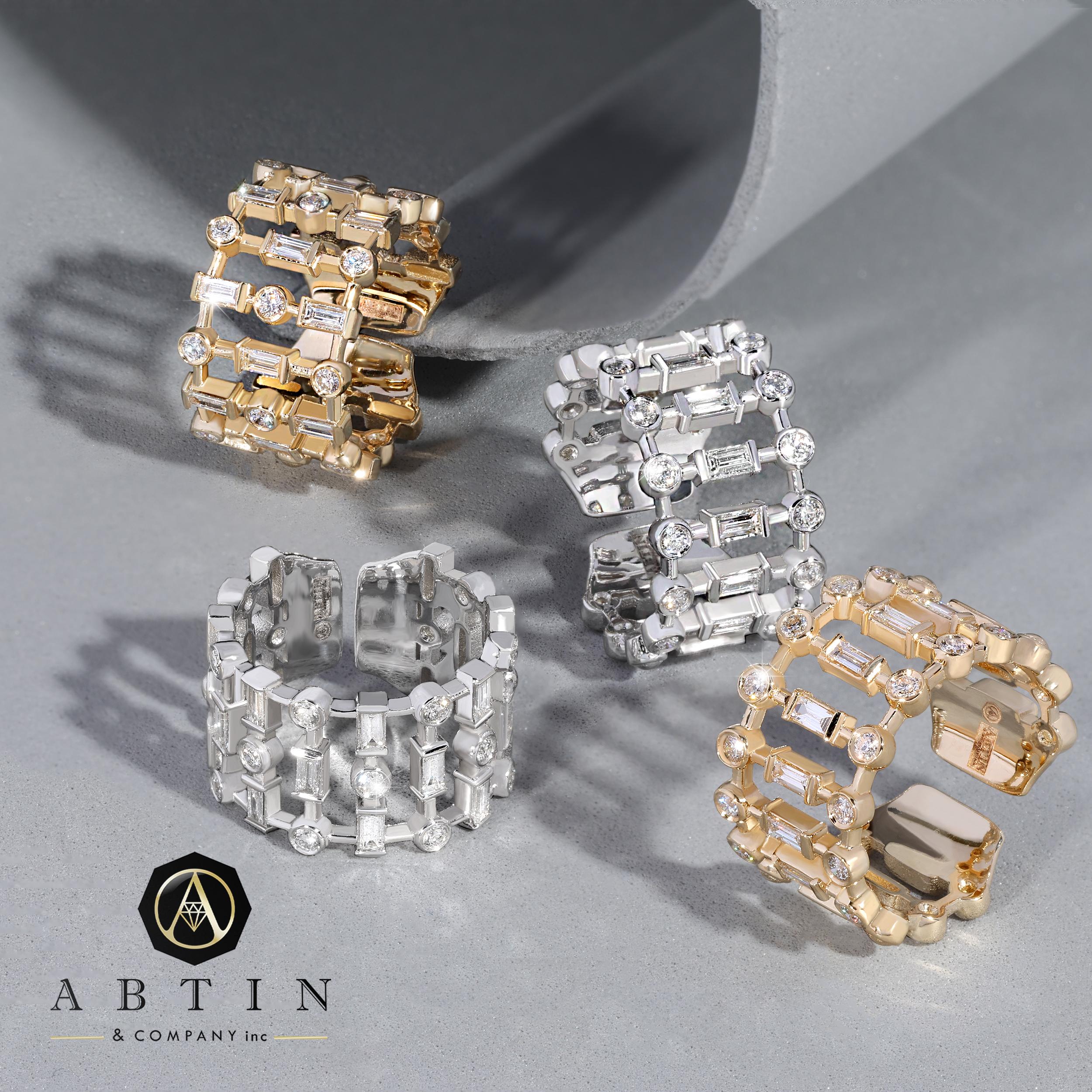 Inspired by the architectural works, this 14K ring is graceful and refined. This statement-making band ring is accented with round & baguette diamonds secured carefully with bezel setting. This one-of-a-kind open ring exudes brilliance and