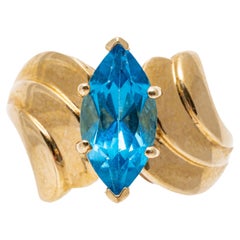 Vintage 14k Yellow Gold Wide Ribbed Bypass Style Marquise Blue Topaz Ring