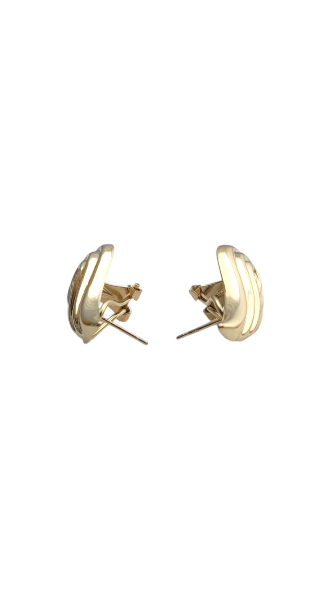 14K Yellow Gold Wings Omega Back Earrings

These 14K yellow gold omega back earrings feature a meticulously detailed wing-shaped design. These earrings offer a secure wear with their hinged closure, perfect for a sophisticated and stylish