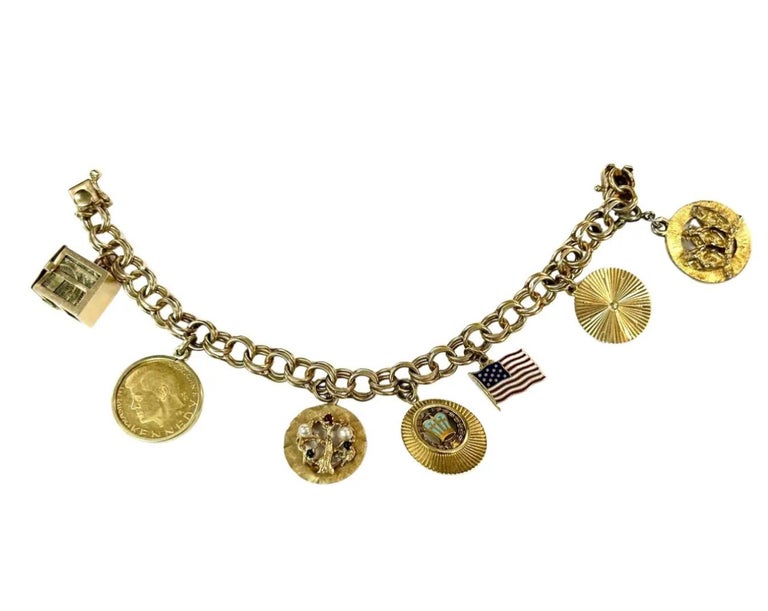 1stDibs Gold 1960s 14kt Charm Bracelet 8 Charms Retro