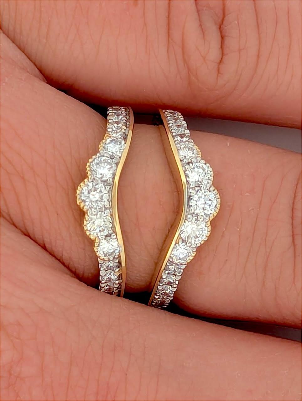 Designed for those who appreciate luxury and craftsmanship, this 14K yellow gold wrap ring features 1.00 carat of natural diamonds arranged in a brilliant crossover style. The wrap band design gracefully contours the finger, creating a modern yet