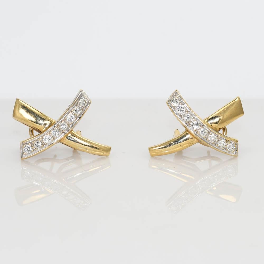 There are 0.80tdw.
The Diamonds range from i-j color, to SI1-SI2 clarity.
The earrings measure 23mm x 4.7mm.
Weighs 8.1 grams.
Stamped and tests 14k 
