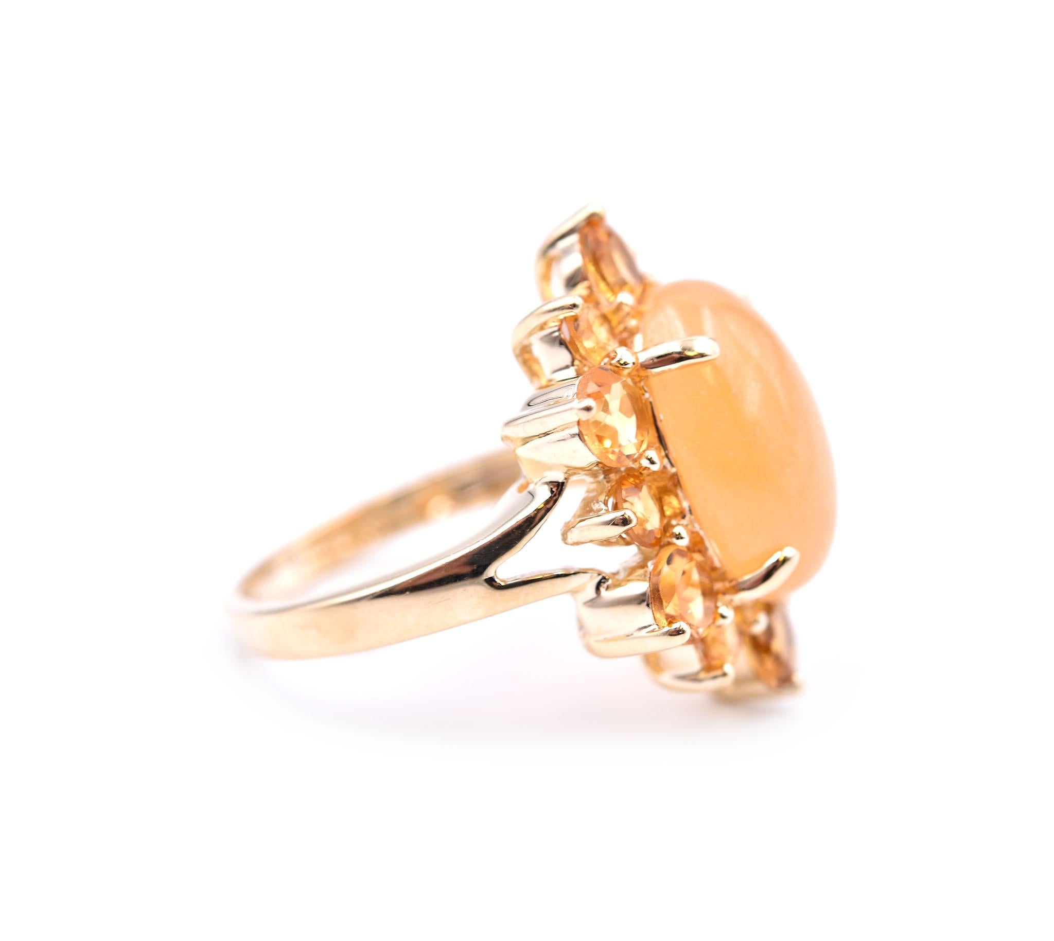 Designer: custom design
Material: 14k yellow gold
Gemstones: 1 cabochon yellow jade = 5.21ct
12 round citrines = 1.00cttw
Ring Size: 6 (please allow two additional shipping days for sizing requests)
Dimensions: ring top measures 22.35mm by