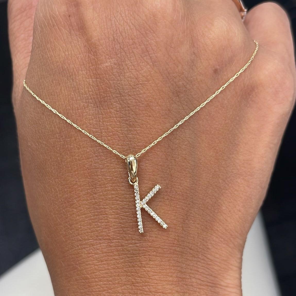 Alphabet Initial Pendant Necklace: Beautiful gold necklace perfectly sized at 16-18 inches in chain length an initial diameter 13mm featuring round diamonds between 0.09 ct - 0.12, allowing you to show off your name, new last name or alma mater.
