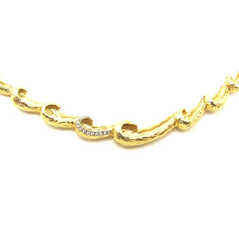 The Wave necklace is a statement piece on its own but can be used as a layer piece if desired.  The length is adjustable for this reason.  
The diamond accent represents the glow from the sun when the wave is at its peak.
The wave necklace is