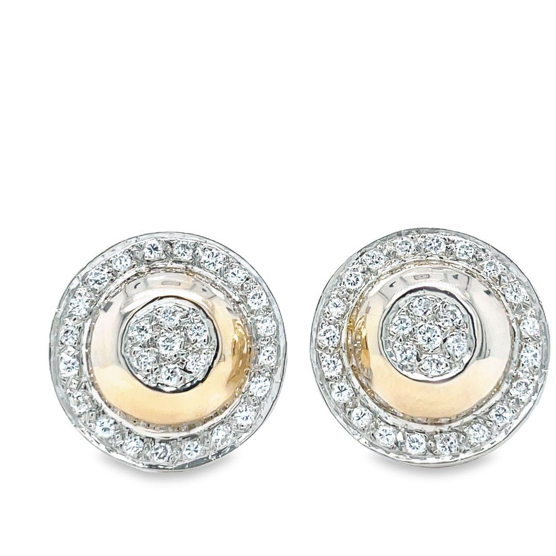 This beautiful and well made pair of earrings is crafted from solid 14k yellow gold and features a round domed shape with a brilliant cluster of fine quality diamonds that are pave set in the center design with diamond outer halo. A delightful