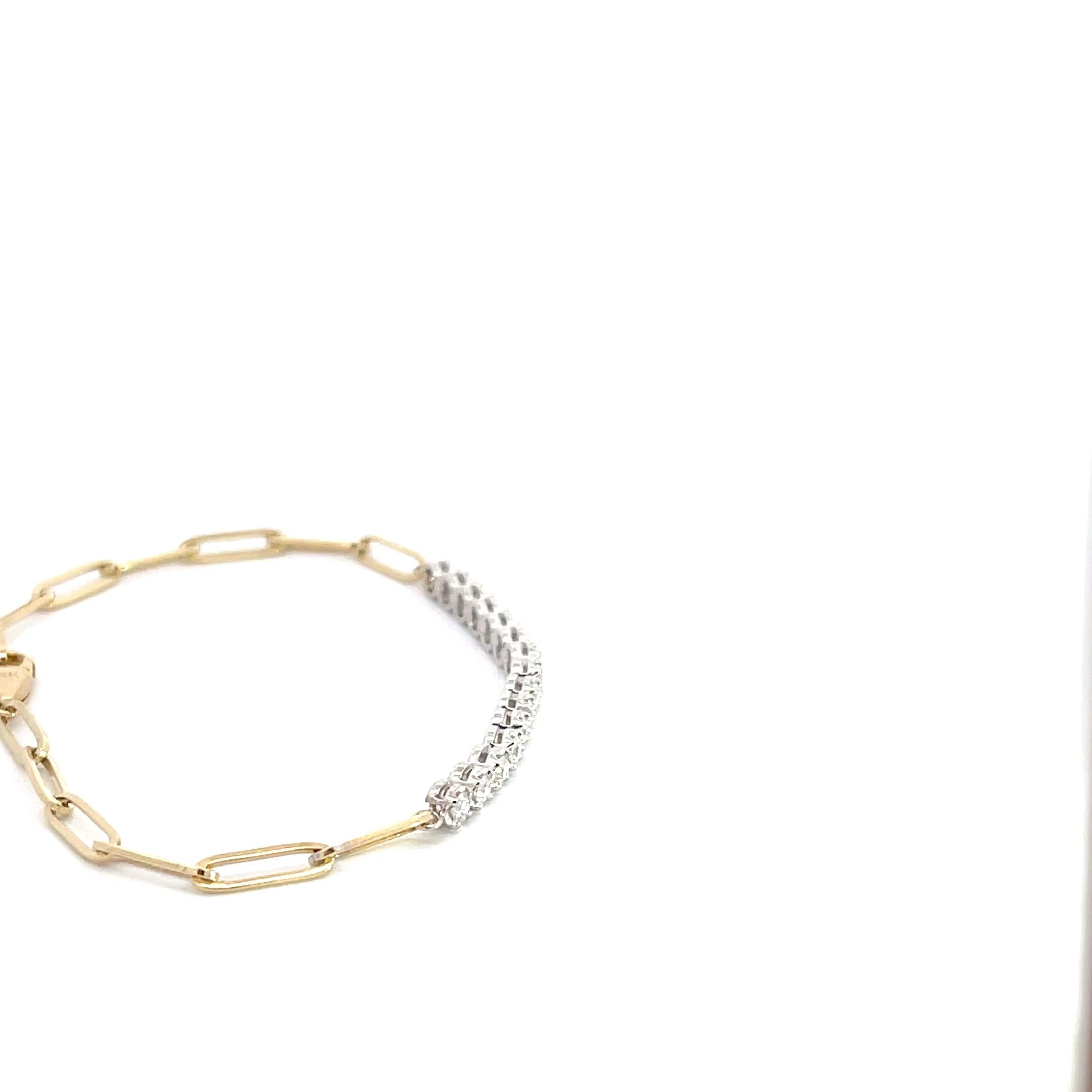 Introducing our stunning 14K Yellow & White Gold 3/4ctw Diamond Paper Clip Bracelet, a harmonious blend of elegance and modernity. Crafted with exquisite precision, this bracelet is a true testament to the brilliance of fine jewelry.

The bracelet