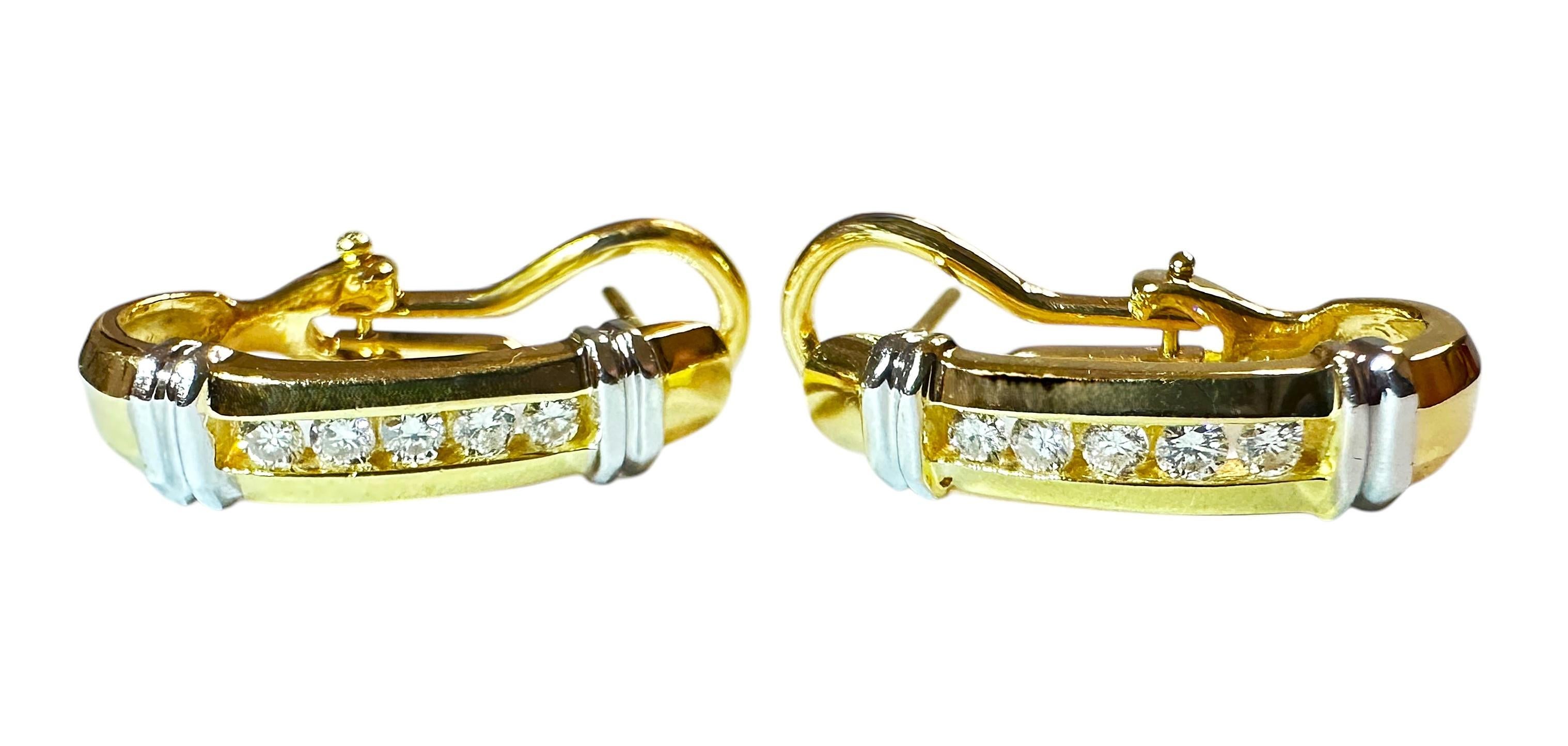 These earrings are just beautiful!  They are 14k yellow with 14k white gold accents.  Each earrings has 5 brilliant cut diamonds, totalling 10 diamonds equalling .30 Carats.. The stones are each 2 mm.  The earrings have an Omega Back and measure