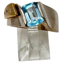 Bague en or jaune/blanc 14 carats avec topaze bleue taille émeraude de 6 mm x 8 mm, taille diamant  7 1/2