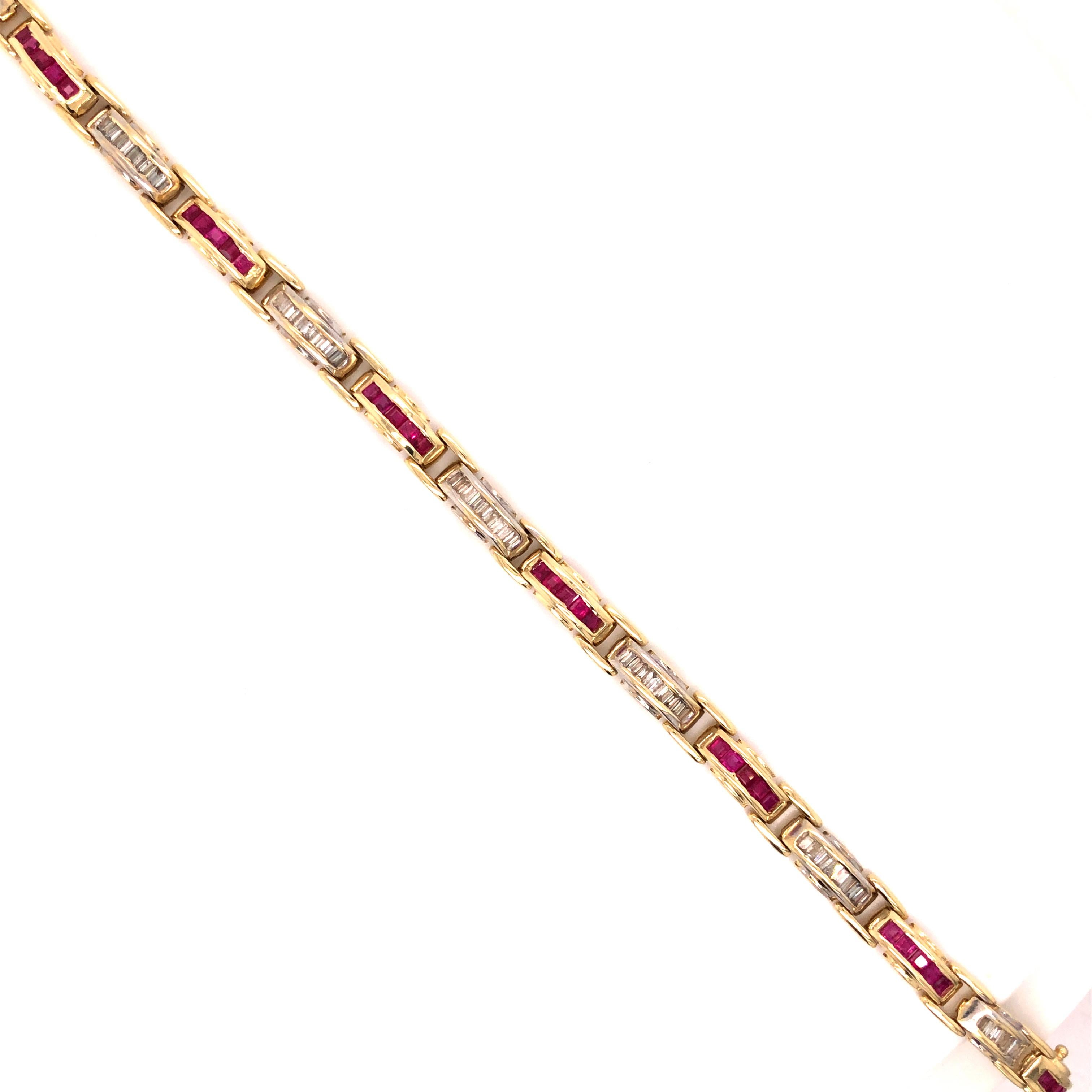 A 14K Yellow & White Gold Diamond Ruby Bracelet. The total diamond weight is approximately 1.5 carat.

Stone: Diamond, Ruby

Metal: 14K Yellow Gold

Size: 7 1/2