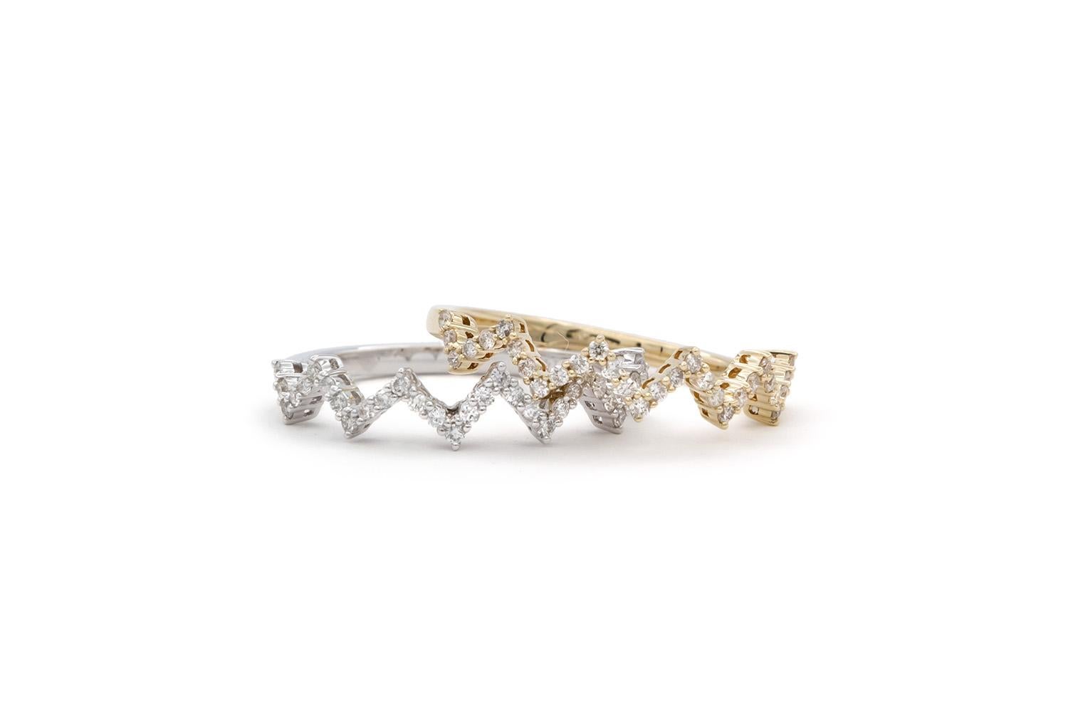 We are pleased to offer these Brand New 14k Yellow & White Gold Diamond Zig Zag Stacking Fashion Rings. They feature 0.38ctw G/VS Round brilliant Cut Diamonds set in 14k gold. They are size 6.5 US and measures 1.15mm wide above the finger and 1.75mm