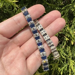 Bracciale in oro giallo e bianco 14k con zaffiro e diamante taglio smeraldo da 19,55 ct.