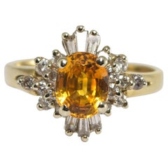 Anello in oro giallo e bianco 14K con zaffiro giallo dorato e diamante